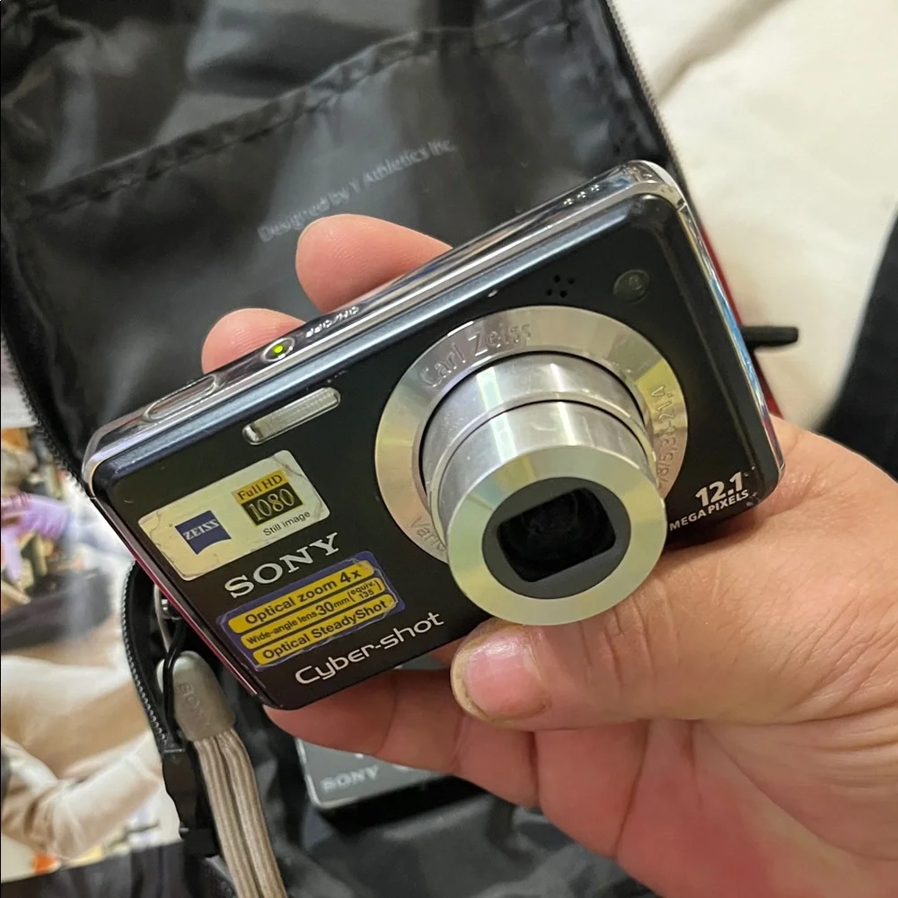 Sony Black and Silver Compact Digital Camera with Case and Accessories